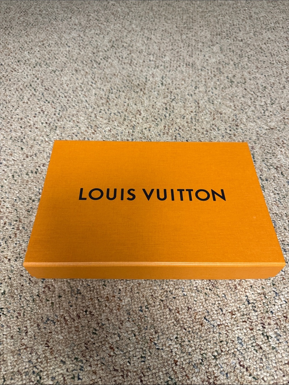 Box with Louis Vuitton branding